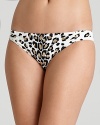 Pair this leopard print bikini bottom from Carmen Marc Valvo with matching tankini top or solid swim separates. The ivory, black and gold palette is designed to flatter.