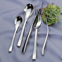 Nicola Flatware by Couzon features a heavy weight and contemporary curves for the modern table. The signature offset knife blade feels very natural in the hand. Perfectly balanced, superior 18/10 quality. Nicola Flatware by Couzon features a heavy weight and contemporary curves for the modern table. The signature offset knife blade feels very natural in the hand. Perfectly balanced, superior 18/10 quality.
