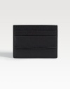 Superior leather craftsmanship in a slim-line design that fits easily into a jacket pocket. Debossed logo accent Four credit card slots 4W X 3H Made in Italy 