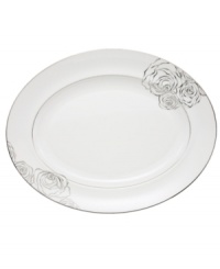 With Monique Lhuillier's designer touch, luxe bone china blossoms into the gorgeous Sunday Rose oval platter. Featuring bands of platinum, luscious blooms and twinkling dots. With Monique Lhuillier's designer touch, luxe bone china blossoms into the gorgeous Sunday Rose oval platter. Featuring bands of platinum, luscious blooms and twinkling dots.
