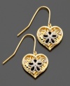 With blossoming flowers set in open hearts, these drop earrings exude pure joy. Crafted in white and yellow 14k gold.  Approximate drop: 3/4 inches.