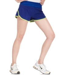 Get moving in Ideology's sporty running shorts. Featuring a comfy, wide waistband and electric neon piping, they're sure to energize any workout! Get moving in Ideology's sporty running shorts. Featuring a comfy, wide waistband and electric neon piping, they're sure to energize any workout!