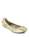 A metallic gray finish makes this Cole Haan ballet flat shine; lace up details lend this style a casual look.