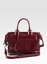 A roomy carryall in luxurious leather, perfectly sized for all your essentials.Double top handles, 6 dropAdjustable shoulder strap, 16½-18½ dropTop zip closureOne inside zip pocketTwo inside open pocketsOne inside pen slotFully lining13W X 10½H X 5¾DImported A roomy carryall in luxurious leather, perfectly sized for all your essentials.Double top handles, 6 dropAdjustable shoulder strap, 16½-18½ dropTop zip closureOne inside zip pocketTwo inside open pocketsOne inside pen slotFully lining13W X 10½H X 5¾DImported