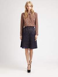 Silk-trim shirt with a Peter Pan collar and back button placket, graphically enhanced by a retro geometric print. Peter Pan collarLong sleevesContour hem hits below hipsBack button placketBody: ViscoseTrim: SilkDry cleanImportedModel shown is 5'9 (176cm) wearing US size 4. Silk-trim shirt with a Peter Pan collar and back button placket, graphically enhanced by a retro geometric print. Peter Pan collarLong sleevesContour hem hits below hipsBack button placketBody: ViscoseTrim: SilkDry cleanImportedModel shown is 5'9 (176cm) wearing US size 4.