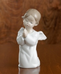 In Spain's renowned Lladró workshops, talented artisans create porcelain sculptures of the highest artistic and technical quality. This Lladró creation is made of fine porcelain, handpainted and glazed to express a special moment. 5 high. In Spain's renowned Lladró workshops, talented artisans create porcelain sculptures of the highest artistic and technical quality. This Lladró creation is made of fine porcelain, handpainted and glazed to express a special moment. 5 high.