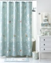 A lovely floral motif in a serene blue and white palette lends an air of nature-inspired sophistication to this Martha Stewart Collection Mariposa shower curtain. Fanciful embroidered butterflies add delightful pops of color.