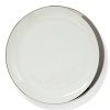 A hand-painted crescent of stunning platinum rims the edges of this thoroughly modern dinnerware collection.