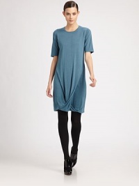 This soft cashmere/silk blend style is finished with an artfully draped twist at the hemline.CrewneckShort sleevesTwisted hemline drapeAbout 24 from shoulder to hem70% cashmere/30% silkDry cleanMade in Italy of imported fabricModel shown is 5'10 (177cm) wearing US size 4. This soft cashmere/silk blend style is finished with an artfully draped twist at the hemline.CrewneckShort sleevesTwisted hemline drapeAbout 24 from shoulder to hem70% cashmere/30% silkDry cleanMade in Italy of imported fabricModel shown is 5'10 (177cm) wearing US size 4.