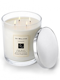 A stunning bouquet lit across four wicks, the luxury candle envelops a room and lingers for hours. Burn time is approximately 230 hours. A stunning bouquet lit across four wicks, the luxury candle envelops a room and lingers for hours. Burn time is approximately 230 hours.