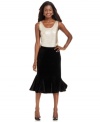 Be dazzling this holiday season in JM Collection's flattering flared skirt, made of soft velour.