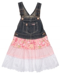 Add some pop with patterns! This overall dress from Osh Kosh gets an update with a tiered, patterned skirt and eyelet detailing for that extra special touch. Add some pop with patterns! This overall dress from Osh Kosh gets an update with a tiered, patterned skirt and eyelet detailing for that extra special touch.