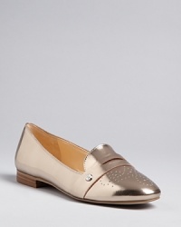 Specchio leather lends drama to these sophisticated IVANKA TRUMP loafer flats, perfect for everyday or play. Specchio leather lends drama to these sophisticated IVANKA TRUMP loafer flats, perfect for everyday or play.