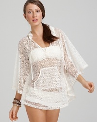 This crochet coverup by Ella Moss is simply perfect when paired with the matching bikini. Add natural wood or semi precious stone bangles for a pure and pristine look. This crochet coverup by Ella Moss is simply perfect when paired with the matching bikini. Add natural wood or semi precious stone bangles for a pure and pristine look.