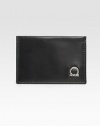 A slim-line design that fits smoothly into an inner blazer pocket in superior calfskin leather with signature gancio detail. Three credit card slots 4½ X 3H Made in Italy