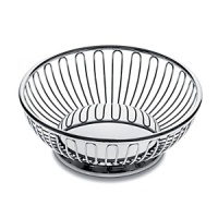 This decorative wire basket smartly stores kitchen essentials - from fruit to vegetables. This decorative wire basket smartly stores kitchen essentials - from fruit to vegetables.