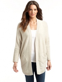 THE LOOKOpen frontCocoon shapeDolman long sleeves with ribbed cuffsDual front patch pocketsRibbed trimShirttail hemVented back hem with buttonsTHE FITAbout 33 from shoulder to hemTHE MATERIALCashmereCARE & ORIGINHand wash or dry cleanImportedModel shown is 5'8 (173cm) wearing US size Small. THE LOOKOpen frontCocoon shapeDolman long sleeves with ribbed cuffsDual front patch pocketsRibbed trimShirttail hemVented back hem with buttonsTHE FITAbout 33 from shoulder to hemTHE MATERIALCashmereCARE & ORIGINHand wash or dry cleanImportedModel shown is 5'8 (173cm) wearing US size Small.
