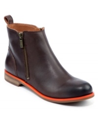 A bright pop of color makes Lucky Brand's Dalia booties a bit more stylish than the rest. With an exposed outside zipper and a pull tab on the shaft, this pretty pair will be your new fave. A bright pop of color makes Lucky Brand's Dalia booties a bit more stylish than the rest. With an exposed outside zipper and a pull tab on the shaft, this pretty pair will be your new fave.