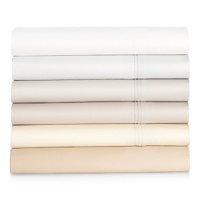 From 500-thread count sateen woven of the finest pima cotton, this Barbara Barry king fitted sheet is adorned with a crisp triple pleat at the cuff. In a new array of modern colors, Pintuck Sateen lends luminous elegance to your bedding repertoire.