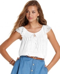 The sweetest thing: tiers of knit ruffles create the daintiest sleeves on a blouson-style top that's altogether lovely! From American Rag. The sweetest thing: tiers of knit ruffles create the daintiest sleeves on a blouson-style top that's altogether lovely! From American Rag.