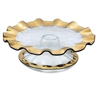 Ancient Italian relics are translated into an abstracted modern design in this handcrafted dinnerware and serving collection from designer Ann Morhauser. This handpainted, 24 karat gold collection tastefully accentuates everything from sleek, modern designs to delicate porcelain, or can be used on its own as a dramatic statement. Ancient Italian relics are translated into an abstracted modern design in this handcrafted dinnerware and serving collection from designer Ann Morhauser. This handpainted, 24 karat gold collection tastefully accentuates everything from sleek, modern designs to delicate porcelain, or can be used on its own as a dramatic statement.