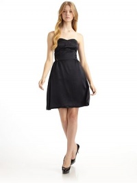 THE LOOKStrapless dress with boned bustier bodiceDiagonal bronze zipper trim at sidesSet-on waist with tuckingBack zipperFully linedTHE FITAbout 30 from natural waistTHE MATERIALHammered silk satinCARE & ORIGINDry cleanImportedOUR FIT MODEL RECOMMENDS ordering one size up as this style runs small. THE LOOKStrapless dress with boned bustier bodiceDiagonal bronze zipper trim at sidesSet-on waist with tuckingBack zipperFully linedTHE FITAbout 30 from natural waistTHE MATERIALHammered silk satinCARE & ORIGINDry cleanImportedOUR FIT MODEL RECOMMENDS ordering one size up as this style runs small.