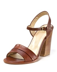 A chunky block here lends modernity to these trend-right sandals from Stuart Weitzman.