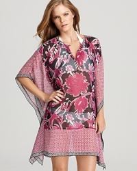 In breezy gauzy silk with a retro-inspired print, this kimono-style caftan beach coverup will certainly keep you covered in the fashion department; by Tory Burch. In breezy gauzy silk with a retro-inspired print, this kimono-style caftan beach coverup will certainly keep you covered in the fashion department; by Tory Burch.