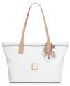 Welcome winter white with this frosted carryall from GUESS.  Pristine faux leather is outfitted with signature detailing and contrast trim, while the spacious interior fits all your fashionista finds.