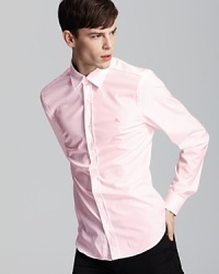 A welcome addition to the modern man's wardrobe, this handsome button-down from Burberry Brit features a classic fit for a comfortable drape. A welcome addition to the modern man's wardrobe, this handsome button-down from Burberry Brit features a classic fit for a comfortable drape.