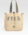 Each FEED 2 Bag provides school meals to two children for one year through the UN World Food Programme (WFP).  Crafted of organic cotton and natural burlap, this versatile messenger design for men and women is the perfect grocery shopping or travel essential.Double top handles, 11 dropCrossbody strap, 23 dropCopper ring and strap closureThree open pockets on cotton sideOrganic cotton and natural burlap reversible lining15W X 15H X 6DImported
