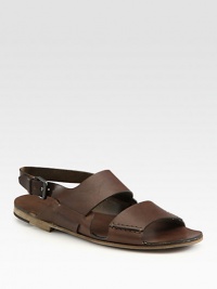 A distinguished sandal crafted from genuine Italian calfskin leather, destined to be a warm weather favorite.Leather upperLeather liningLeather soleMade in Italy A distinguished sandal crafted from genuine Italian calfskin leather, destined to be a warm weather favorite.Leather upperLeather liningLeather soleMade in Italy
