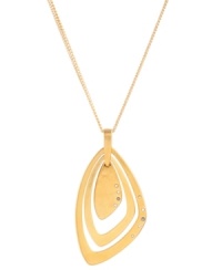 Geometrical gold. Kenneth Cole New York's gold plate orbital pendant necklace is made of mixed metal and features pave crystal accents with metal and glass stone detailing. Approximate length: 18 inches + 3 inch extender. Approximate drop: 2-3/4 inches. Geometrical gold. Kenneth Cole New York's gold plate orbital pendant necklace is made of mixed metal and features pave crystal accents with metal and glass stone detailing. Approximate length: 18 inches + 3 inch extender. Approximate drop: 2-3/4 inches.