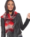 Rock the tribal trend with this cozy scarf from Cejon that wraps up any winter ensemble in bold color and serious style.