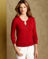 Tommy Hilfiger's solid cardigan features goldtone buttons for a classic touch. Dress it up with a sweater or dress it down with jeans!