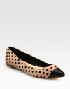Darling polka-dot print and contrasting leather toecap define this luxurious calf hair flat. Printed calf hair and leather upperLeather lining and solePadded insoleImported