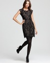 Stylish cap sleeves and an allover stunning lace design enrich this Joie dress with the trendsetting look of the season--it's the perfect solution to the age old, what-to-wear-to-the-party dilemma.