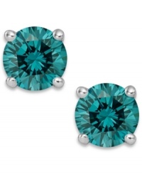 Add an ocean of color, in one small drop. These sparkling stud earrings feature round-cut blue diamonds (1 ct. t.w.) in a four-prong setting of 14k white gold. Approximate diameter: 1/4 inch. Add an ocean of color, in one small drop. These sparkling stud earrings feature round-cut blue diamonds (1 ct. t.w.) in a four-prong setting of 14k white gold. Approximate diameter: 1/4 inch.
