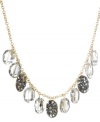 Faceted fashion. Kenneth Cole New York's sophisticated frontal necklace features subtly shimmering glass beads and crystal-accented discs in hematite hues. Strung from a gold tone mixed metal chain. Approximate length: 17 inches + 3-inch extender. Approximate drop: 1 inch.