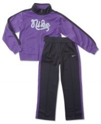 This sporty track jacket and pant set from Nike will have her comfy and looking cool. This sporty track jacket and pant set from Nike will have her comfy and looking cool.