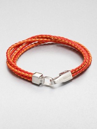 Boldly-hued, braided strands of fine leather are offset by a sterling silver clasp.LeatherSterling silverAbout 2½ diam.Made in the United Kingdom