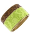 Delicate and demure meets bold and funky. Pretty lace fabric in bright citrus and brown adorns this chunky bangle by Jessica Simpson. A hinge clasp holds it in place. Set in gold-plated mixed metal. Approximate diameter: 3-1/2 inches.