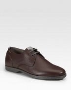 A two-eyelet derby style designed in pebbled calfskin leather. Leather lining Padded insole Rubber sole Made in Italy 