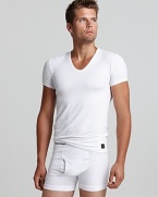 A comfy, slim fit v-neck shirt rendered with Calvin Klein's signature minimalist oeuvre.