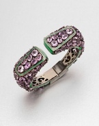 A colorful piece encrusted with faceted amethyst stones set in rhodium-plated sterling silver and accented with bright enamel. AmethystEnamelRhodium-plated sterling silverDiameter, about 2.2Hinged closureImported 