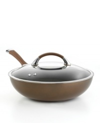 A deep, rich chocolate tone with a superior nonstick finish turns things up in the kitchen, making every meal a mixture of sophistication and ease. Constructed for professional performance with a hard-anodized construction, impact-bonded stainless steel base and dishwasher-safe finish. Lifetime warranty. A deep, rich chocolate tone with a superior nonstick finish turns things up in the kitchen, making every meal a mixture of sophistication and ease. Constructed for professional performance with a hard-anodized construction, impact-bonded stainless steel base and dishwasher-safe finish. Lifetime warranty.