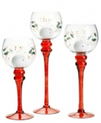 Etched and painted with a festive pattern of holly and berries, the red-stemmed Winterberry candlesticks from Pfaltzgraff make a merry impression in any holiday home.