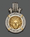 Don mythological beauty with this 14k gold and sterling silver Medusa pendant. Approximate drop: 1-3/4 inches.