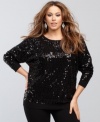 Bring on the sizzle with a sequined-knit plus size sweater from INC!