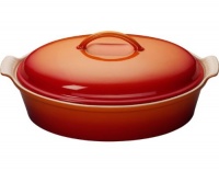 Le Creuset Stoneware 4-Quart Covered Oval Casserole, Flame Le Creuset Stoneware 4-Quart Covered Oval Casserole, Flame